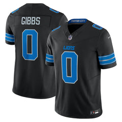 A black and blue football jersey with the name 'GIBBS' and the number '0' printed on it.