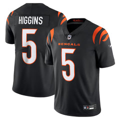 A black and orange football jersey with the name 'HIGGINS' and the number '5' printed on it.