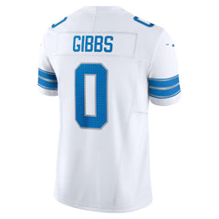 A white football jersey with the name 'GIBBS' and the number '0' printed on the back.