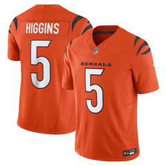 A bright orange football jersey with the name 'HIGGINS' and the number '5' printed on it.