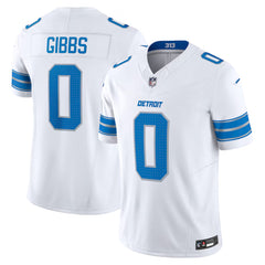 A white football jersey with the name 'GIBBS' and the number '0' printed on it.